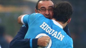 Napoli's forward Gonzalo Higuain celebrates with his head coach Maurizio Sarri after scoring the second goal of the Italian Serie A soccer match between Atalanta Calcio and SSC Napoli at 'Atleti Azzurri d'Italia' Stadium in Bergamo, 20 December 2015. ANSA/ MAGNI